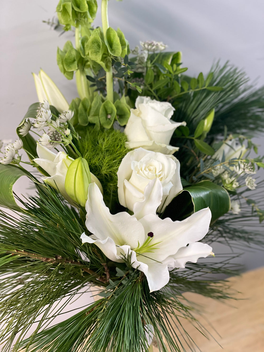 Vased sympathy arrangement