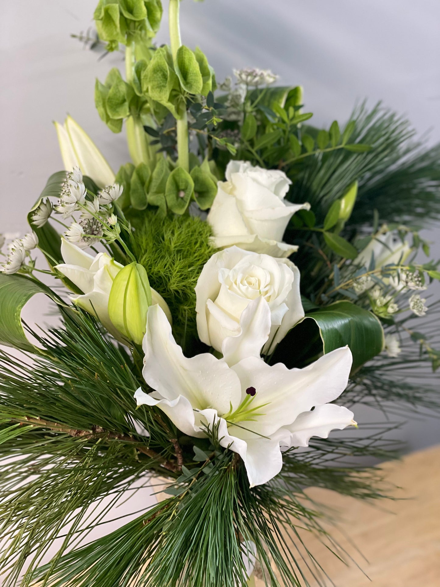 Vased sympathy arrangement