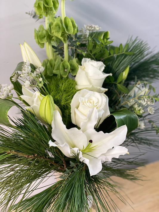 Vased sympathy arrangement