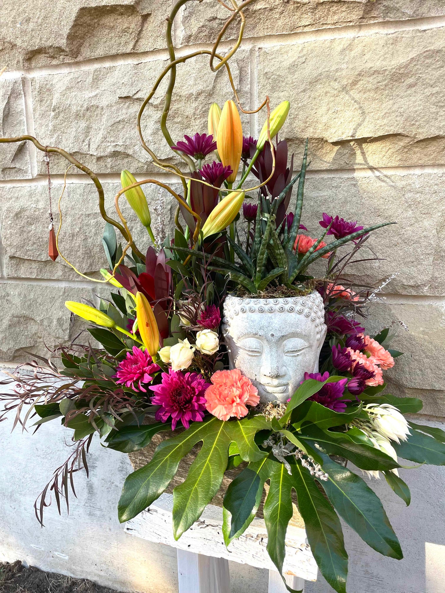 magenta lilies buddah head okotoks florist nikolle boy o boy